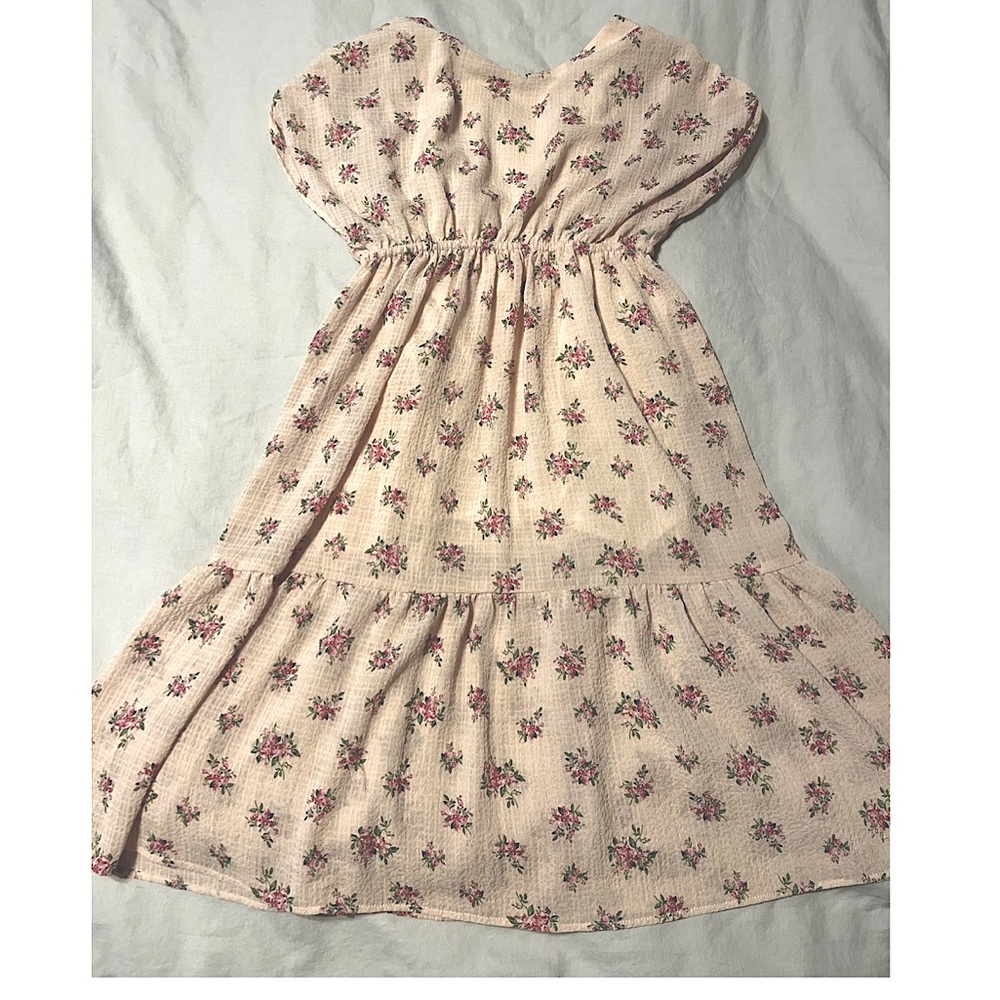 Boho dropped sleeve tiered girls dress. Flowery and fabulous with cut out back.